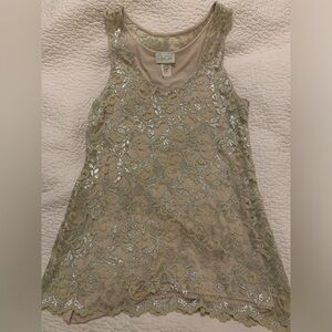 Light pink with silver sleeveless blouse